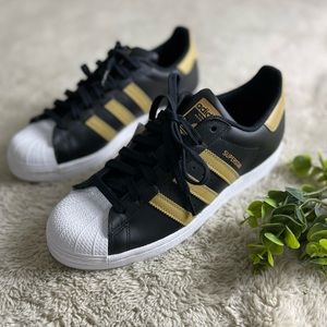 NWT adidas superstars in black and tan size 8.5